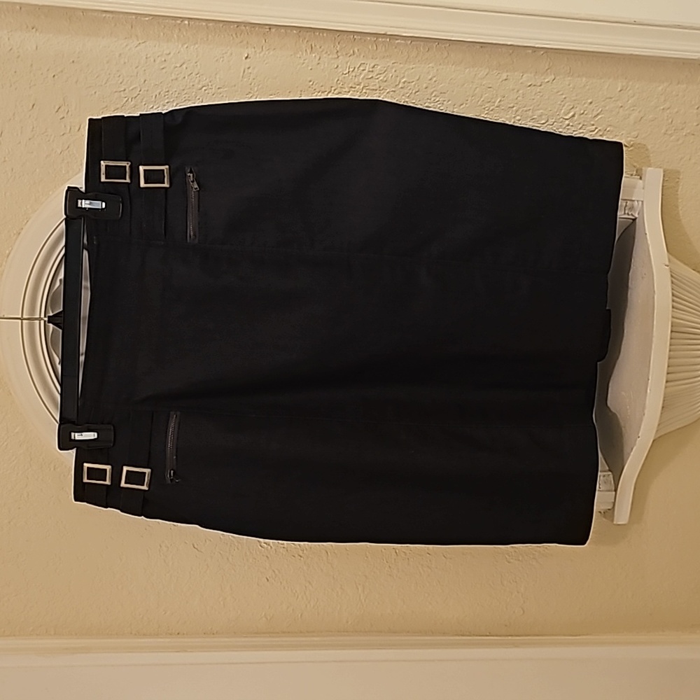 Denim thin, skirt with 2-front zipper pockets &4 brass front buckles & back slit